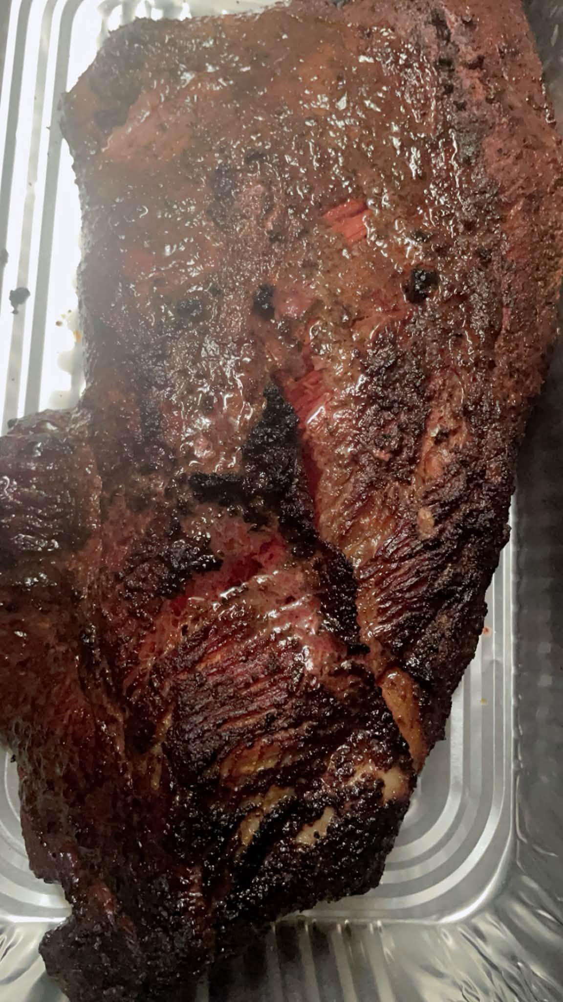 Close-up of grilled meat on metal tray